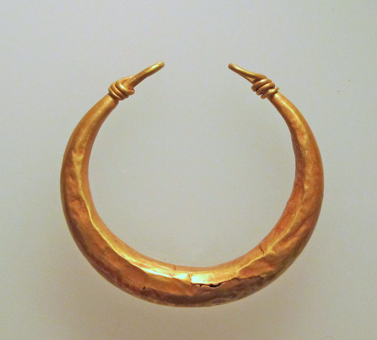 Earring of simple form, Bronze Age Cypriot jewelry