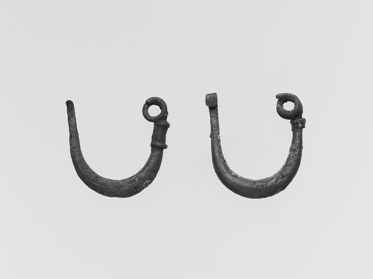 Two silver fibulae (safety pins), Archaic II Cypriot jewelry