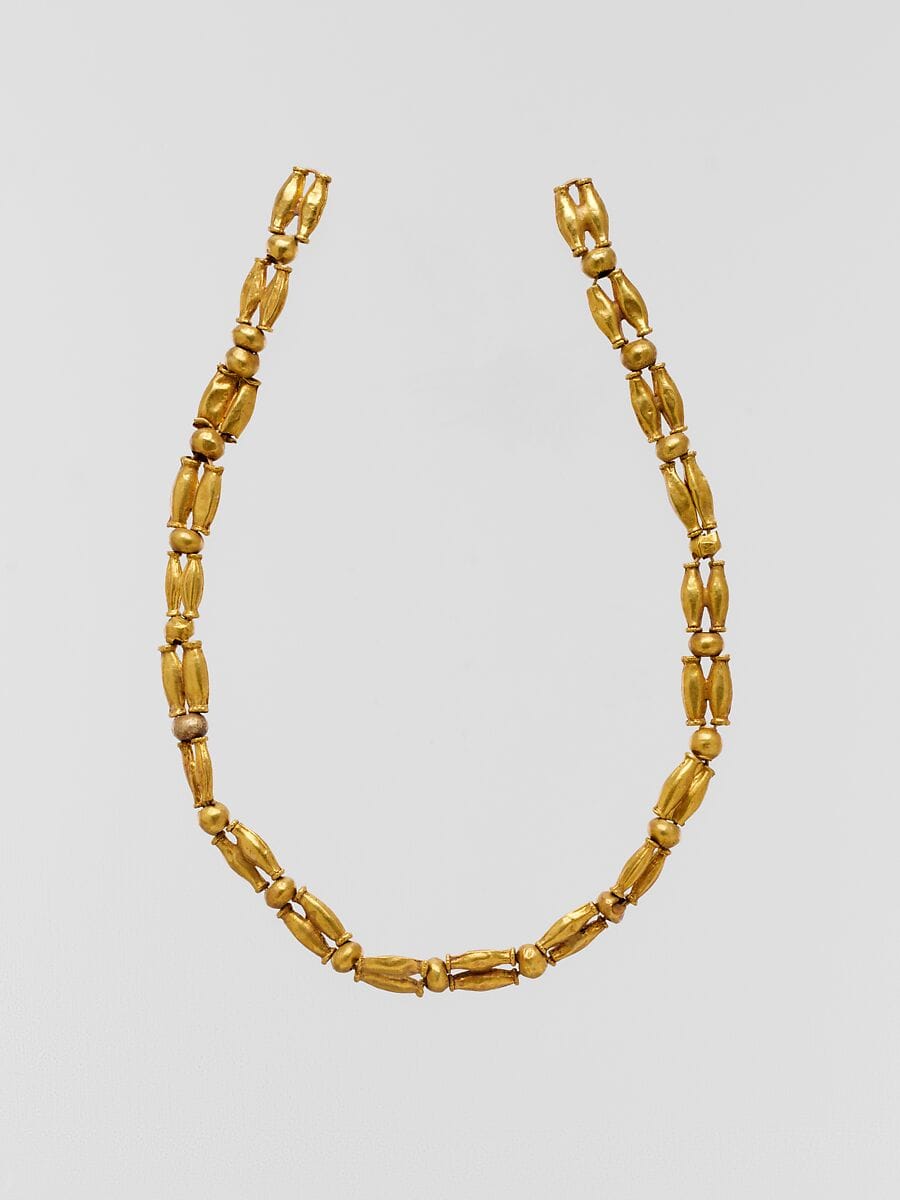 Gold beads, perhaps from a necklace, Archaic II Cypriot jewelry