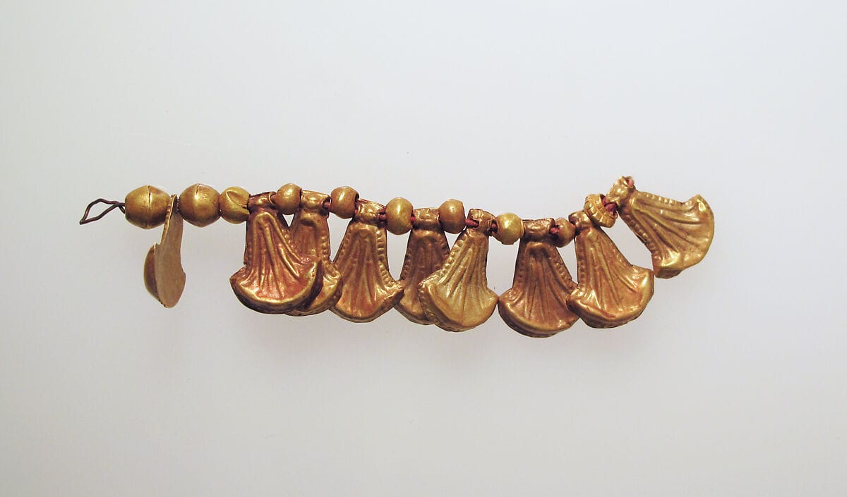 Bead pendant, with lotus flowers, Bronze Age Cypriot jewelry