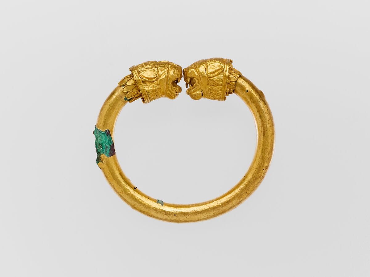 Gold and copper alloy bracelet with lion-head finials, Classical Cypriot jewelry
