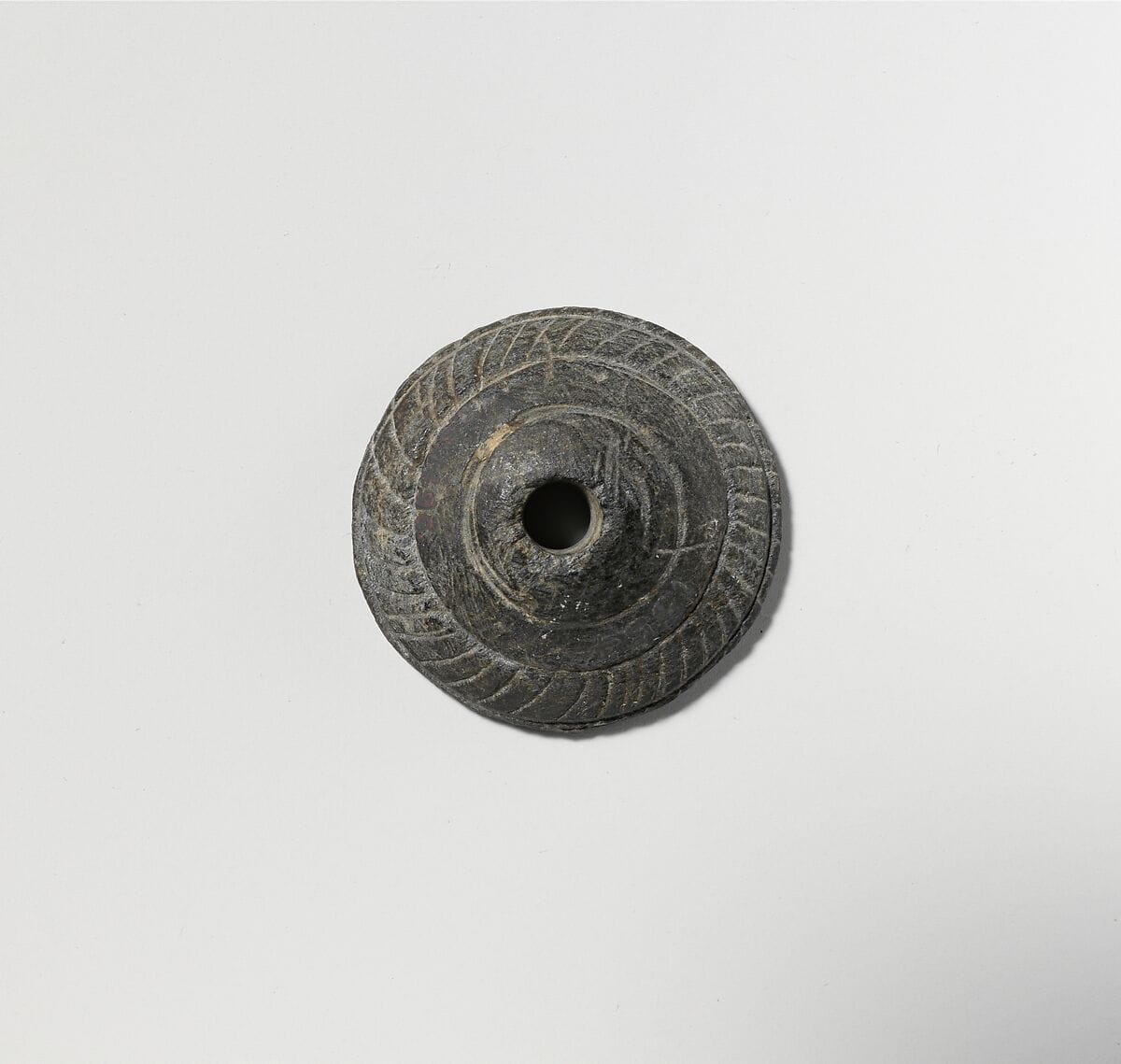 Schist spindle whorl, Late Bronze Age III Cypriot tool
