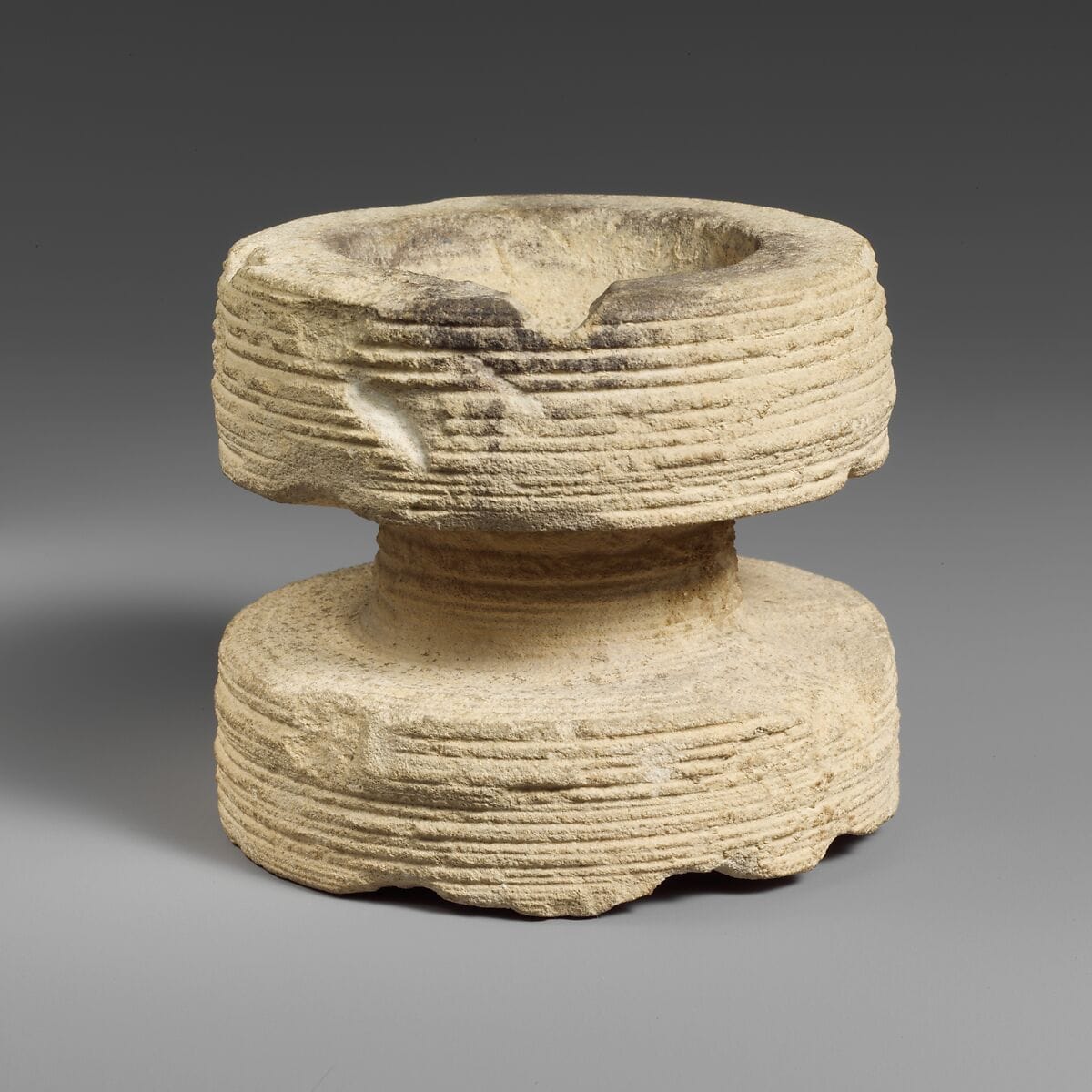 Circular limestone incense burner, Bronze Age Cypriot dish