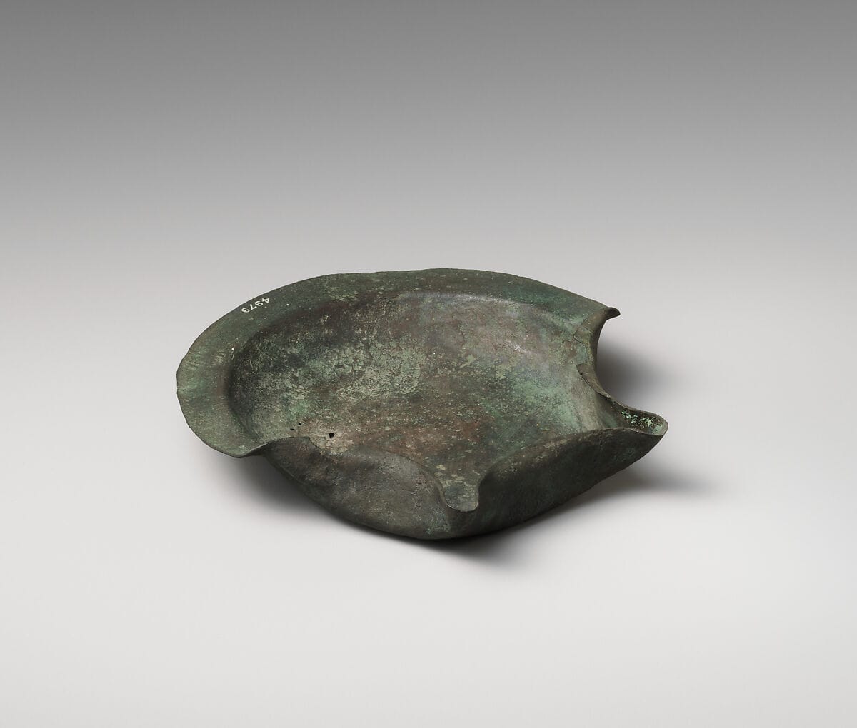 Bronze saucer-shaped lamp, Archaic II Cypriot tool