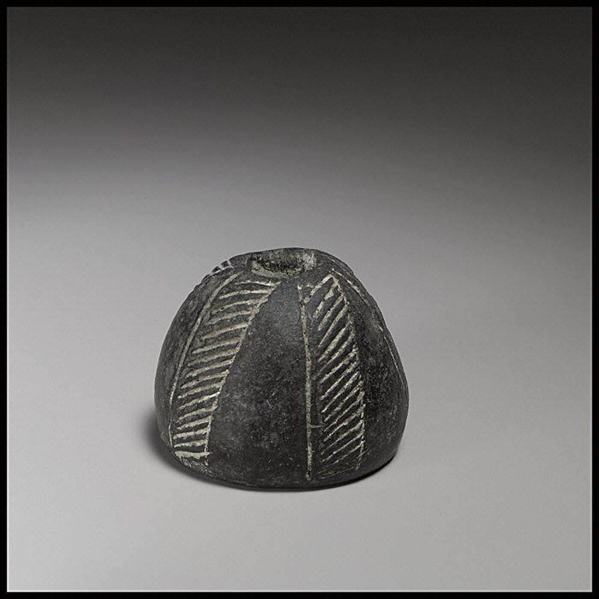 Terracotta conical-hemispherical spindle-whorl with flat base and rounded top, Middle Bronze Age II Cypriot tool