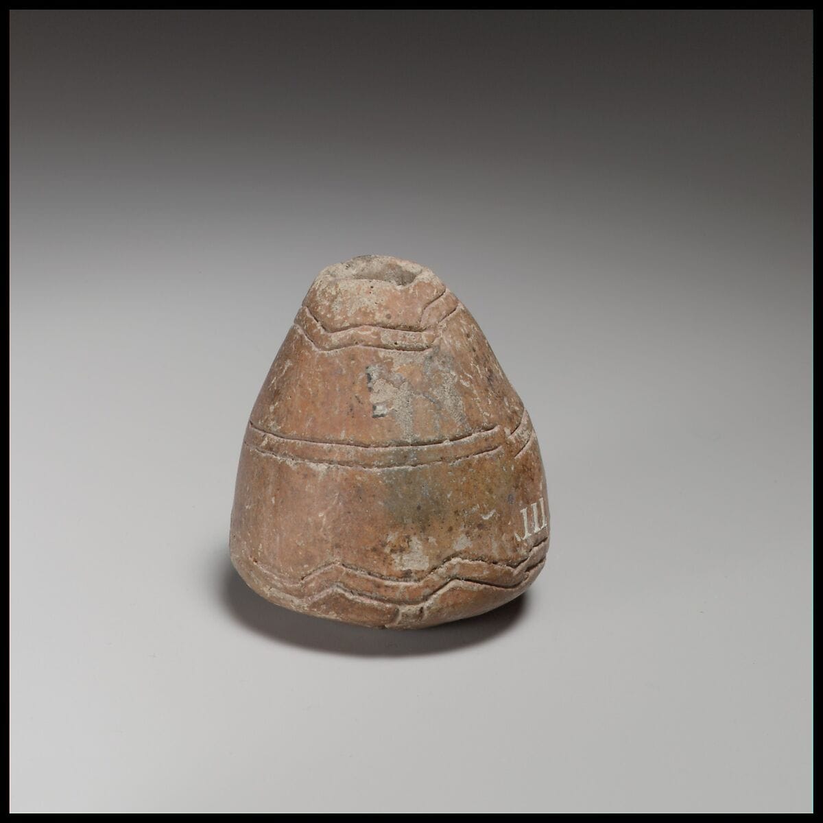 Conical-hemispherical spindle-whorl with slightly rounded base, Middle Bronze Age I Cypriot tool