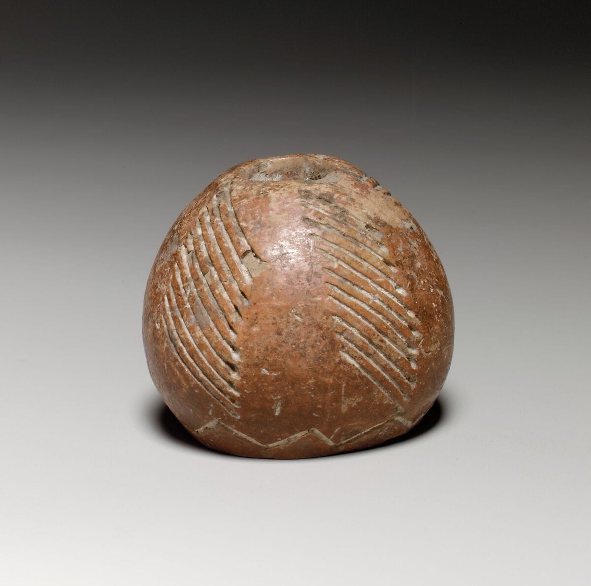 Terracotta conical-hemispherical spindle-whorl with flat base, Middle Bronze Age I Cypriot tool