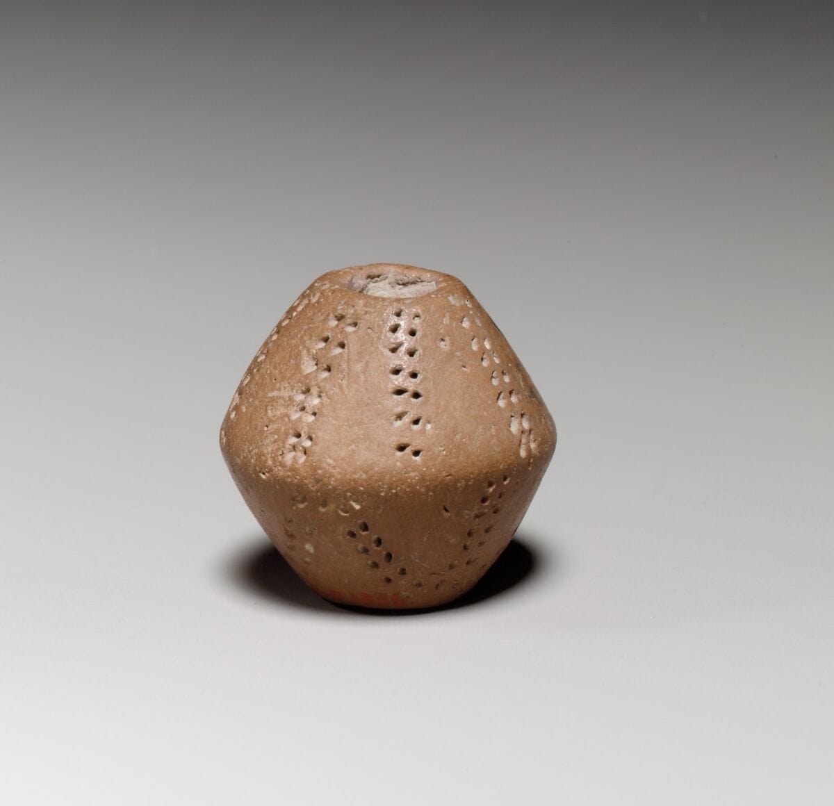 Small terracotta biconical spindle-whorl, Late Bronze Age II Cypriot tool