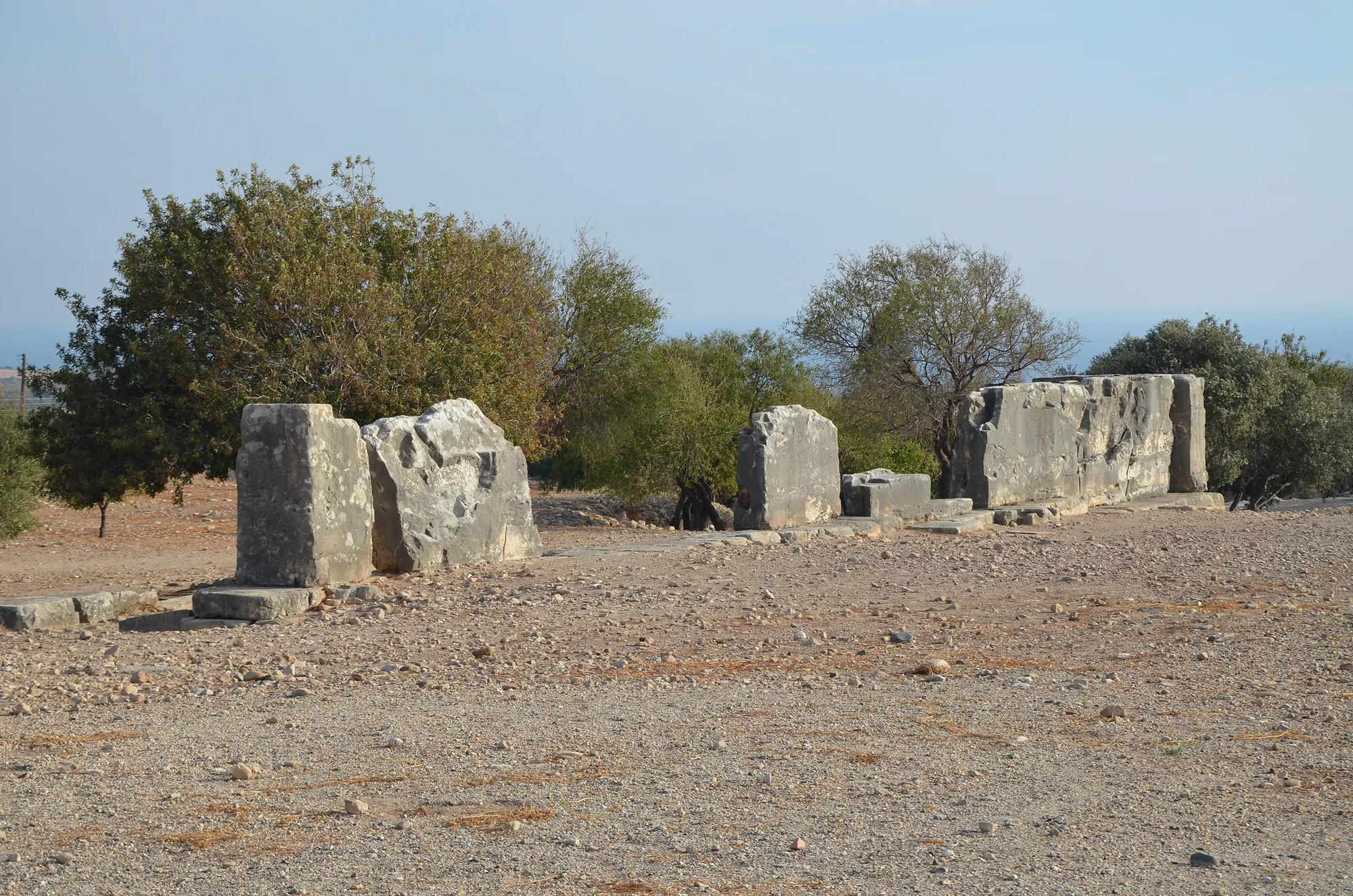Orthostat blocks of the Late Bronze Age temenos wall of Sanctuary I at Palaepaphos (Kouklia), c. 1200 BCE. Photo: Carole Raddato, cropped, CC BY-SA 2.0, via Wikimedia Commons