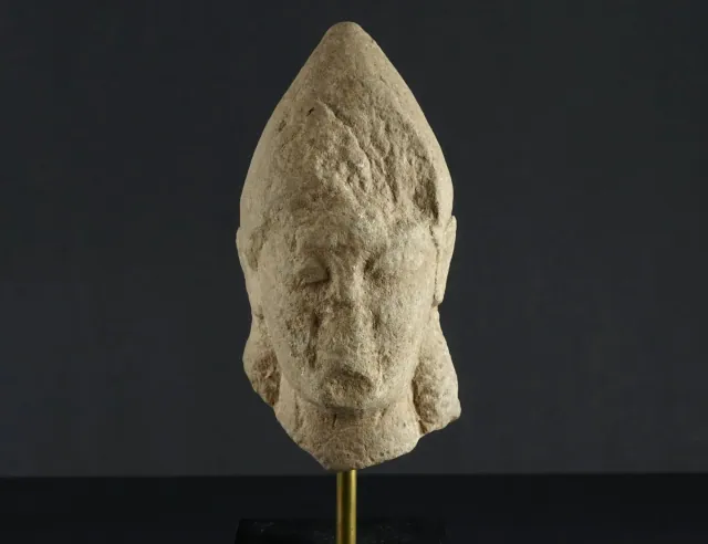 Weathered Limestone Head of a Votary in a Tall Pointed Cap