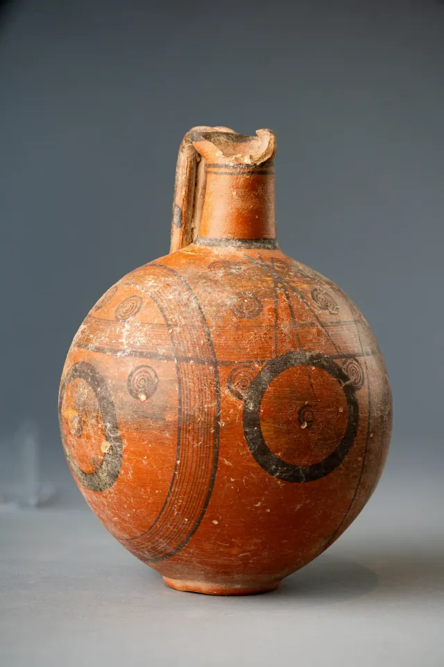 Black-on-Red Globular Jug with Concentric-Circle Decoration